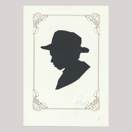 
        Front of silhouette, with boy in frame looking left, wearing a hat.